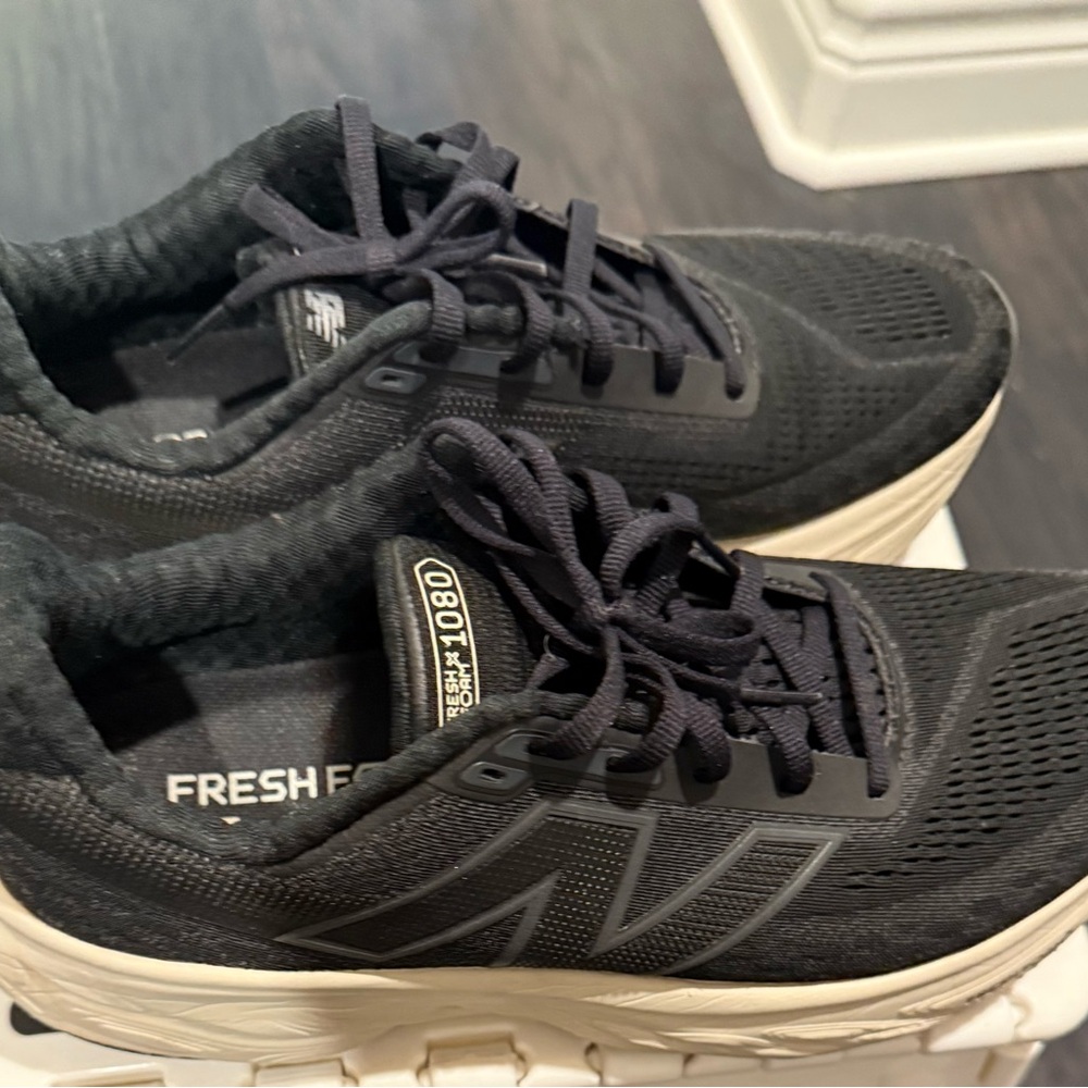 New Balance Black Athletic Shoes with Cream Soles